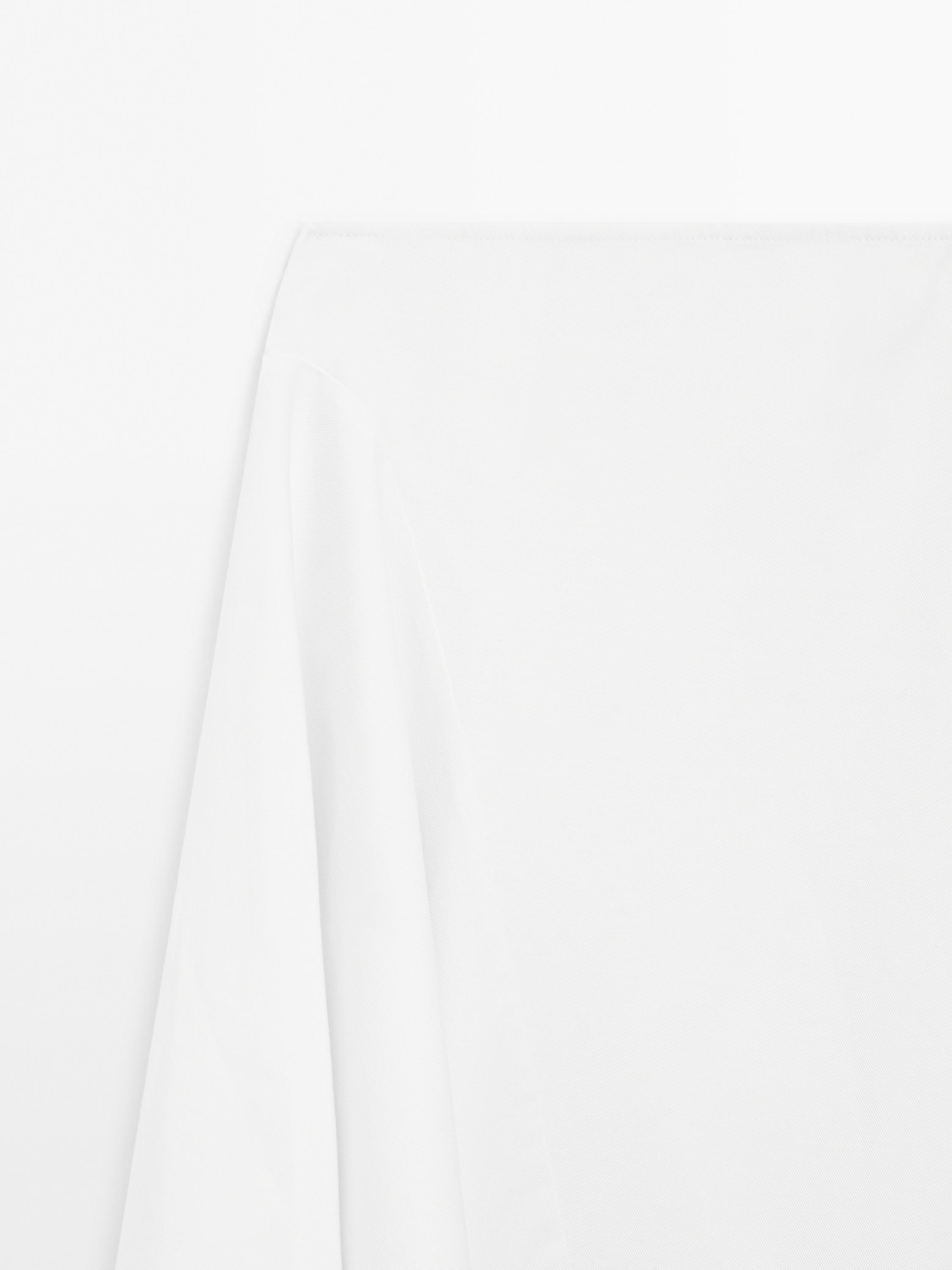 Asymmetric denim midi skirt